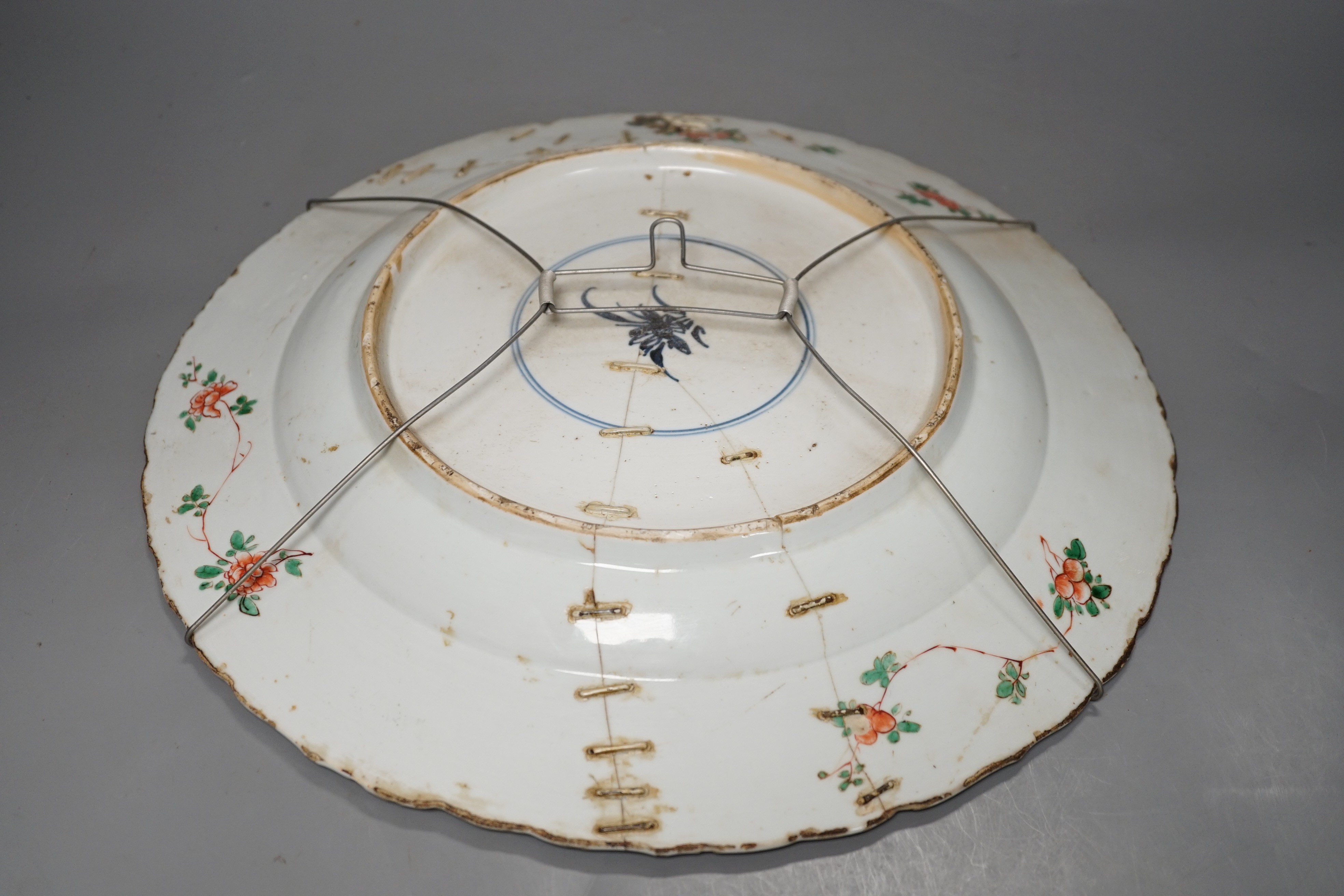 A Chinese Kangxi famille verte dish (repaired), 36cms diameter